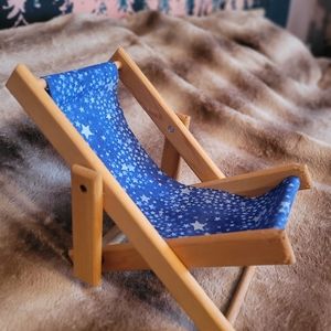 Adorable, adjustable sling-back beach chair for dolls